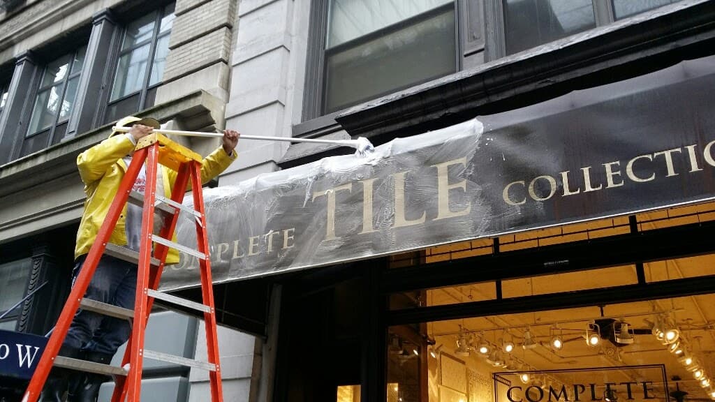 Professional awning cleaning services in NYC - commercial awning before and after cleaning